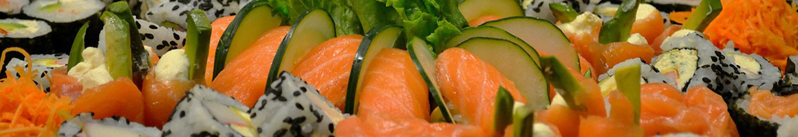 Eating Sushi at Tora Sushi Lounge restaurant in Seaside, OR.